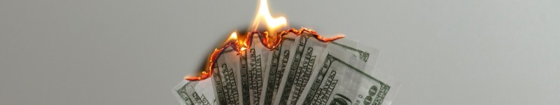 dollars burning
