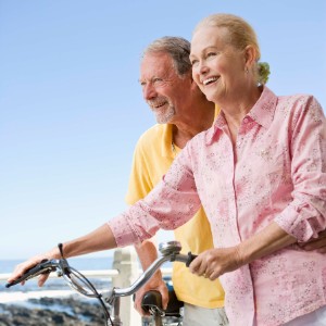 couple on bicycles-senior travel clubs